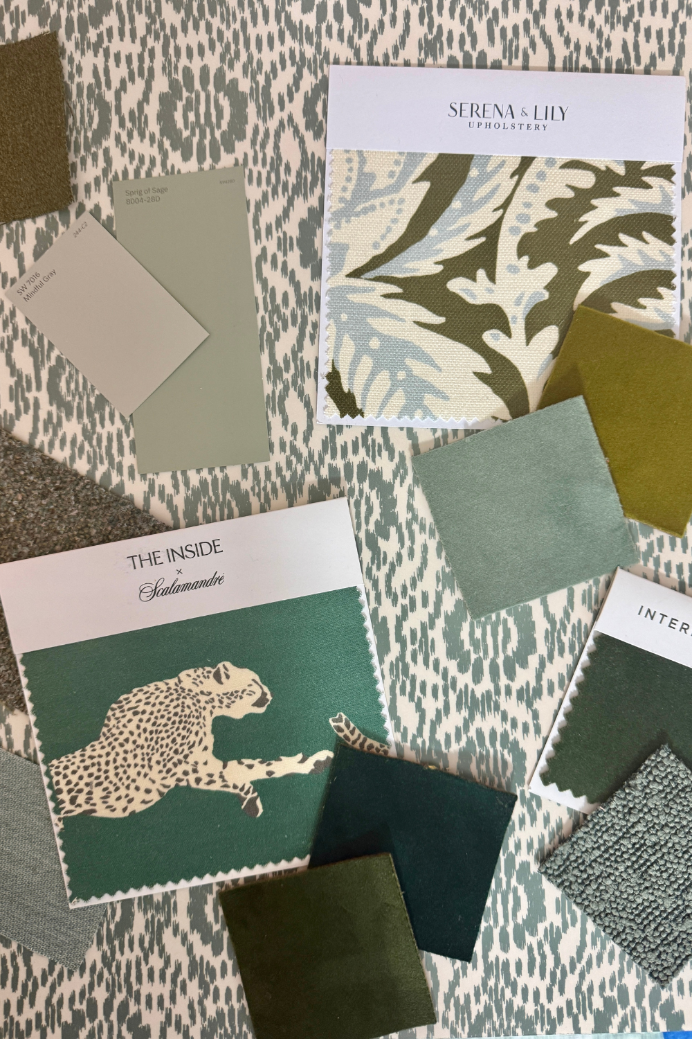 Collection of patterned paper samples with 'Serena & Lily' branding on a textured surface.