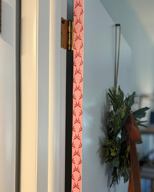 Bow Tied Holiday Door Detail Strip | Peel and Stick Christmas Door Accent | Red Pink Bow Door Trim