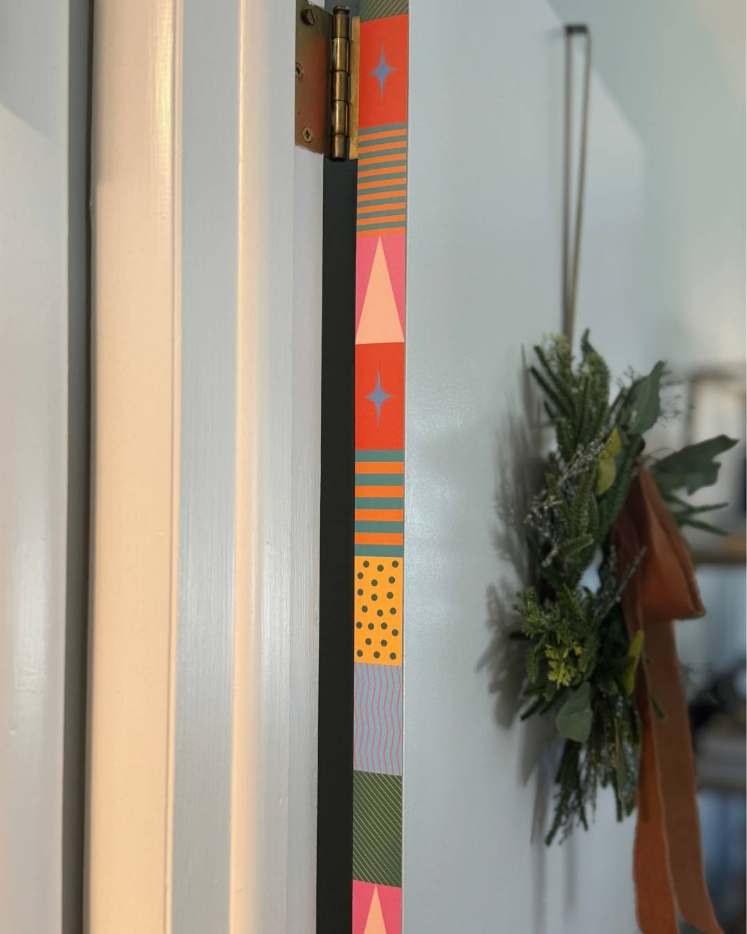Merry Modern Holiday Door Detail Strip | Peel and Stick Christmas Door Accent | Colorful Retro Door Trim
